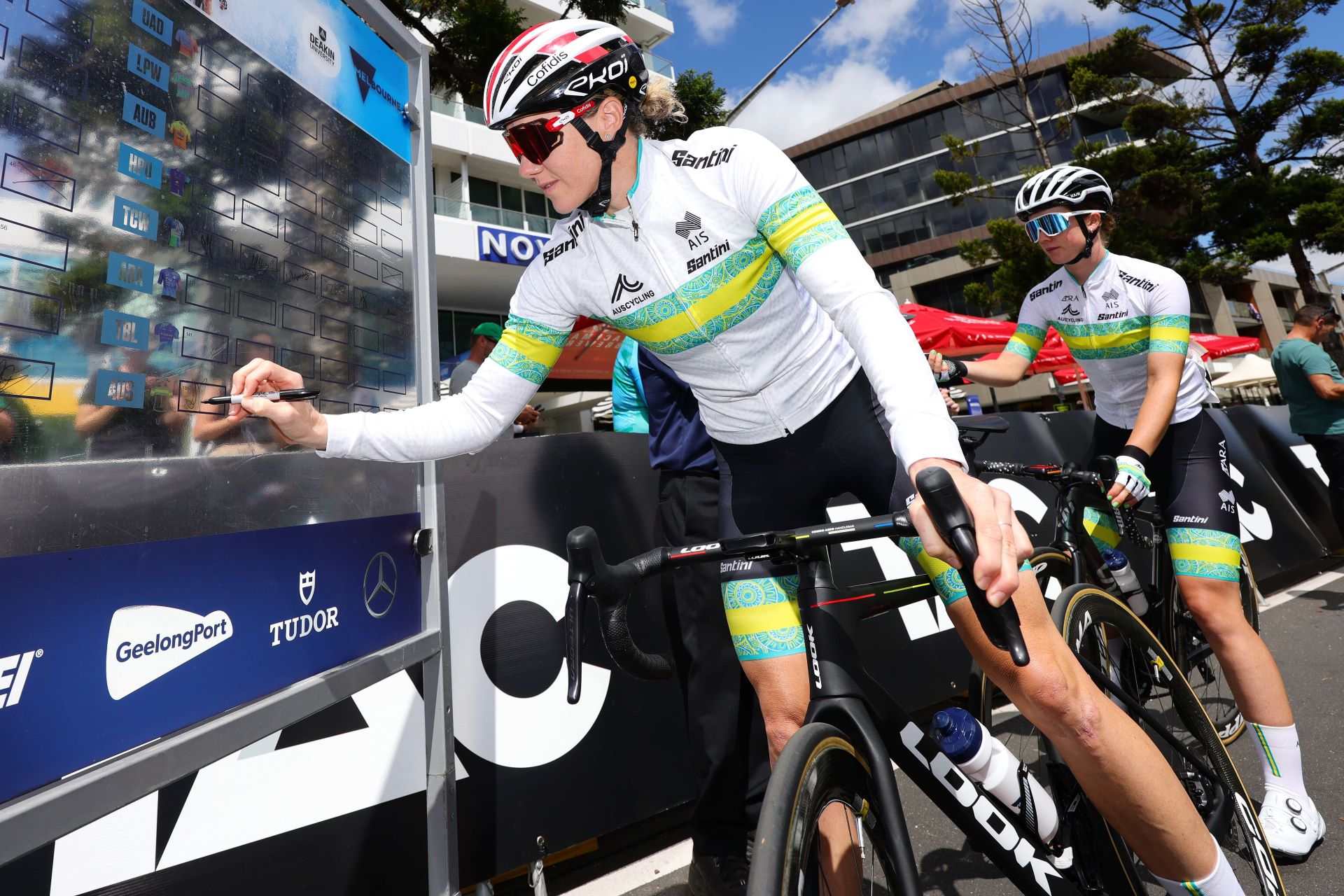 Sarah Roy signing on for the Deakin University Women's Road Race in 2024 as part of the ARA Australian Cycling Team. Picture: Con Chronis